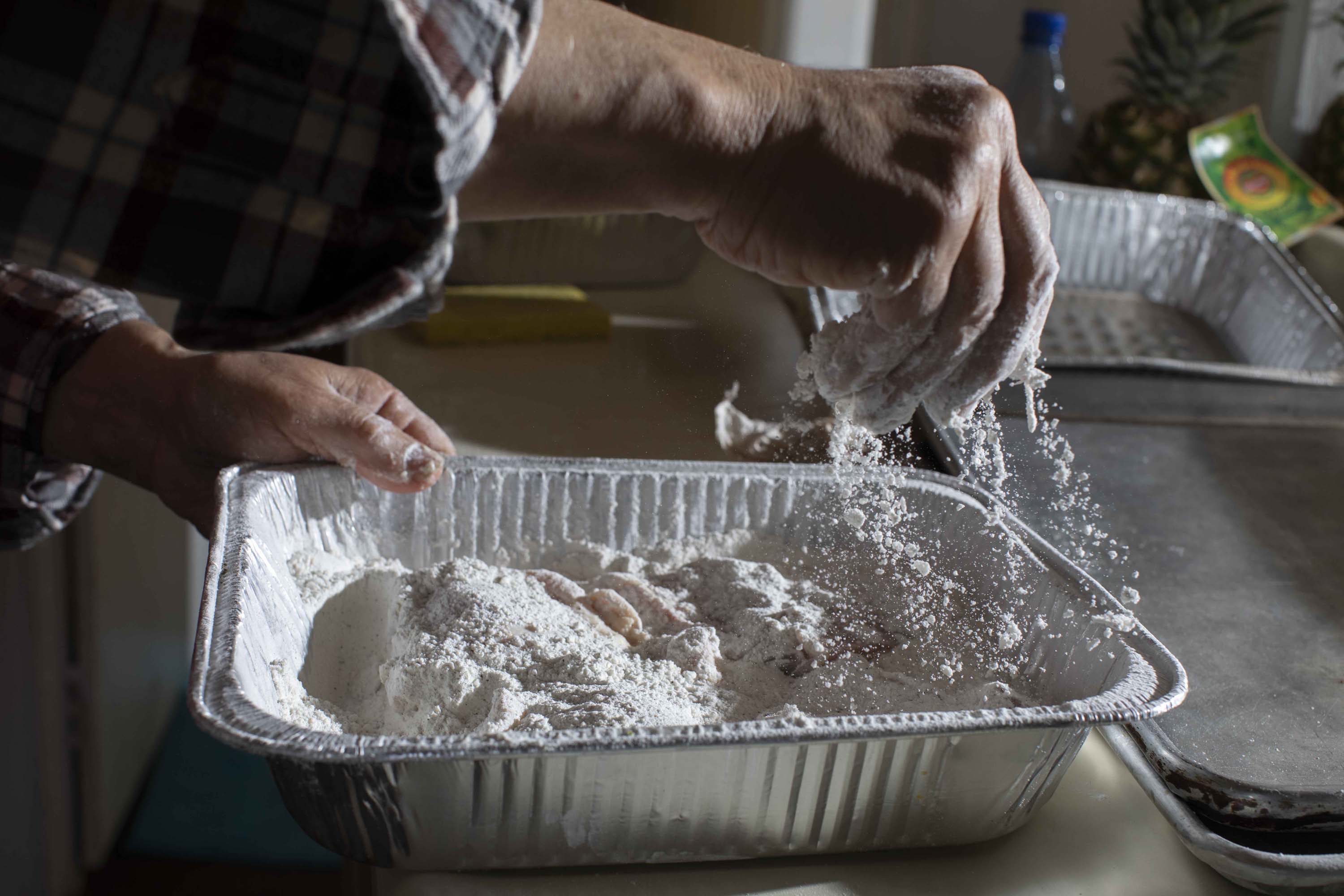 Emam Saber, 77, cooks at his San Francisco home. Saber, who is now retired, used to work as a chef at San Francisco hotels, including the St. Francis and Fairmont.